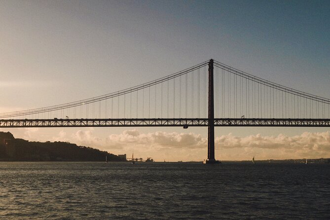 4 Hours Private Tour with Dives in Catamaran in Lisbon - Discoveries Monument and the Belém Tower area from the water