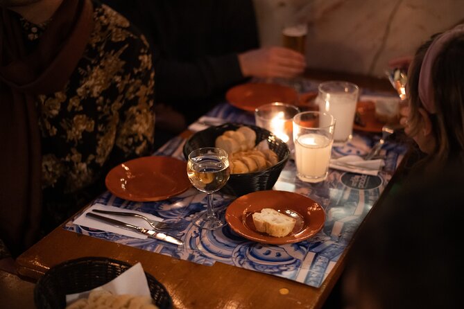 A True Taste of Lisbon: Portuguese Tapas, Wine & Surprise Drink - Wine pacing: enjoy it, but don’t let it run the night