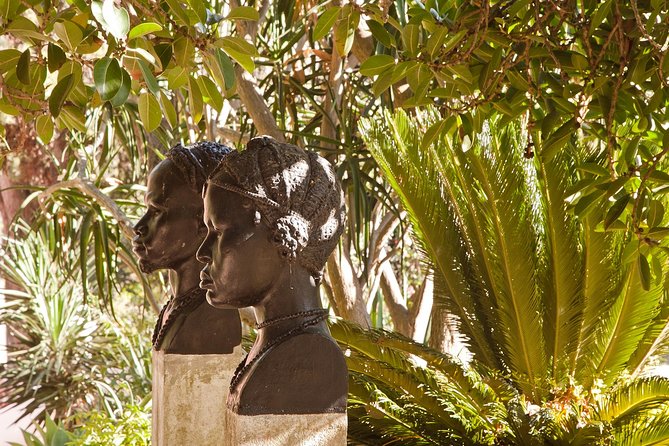 Belém District and the Salazar Dictatorship Legacy - Private Walking Tour - Praca do Imperio: heraldic flower beds, fountains, and the 1940 hub