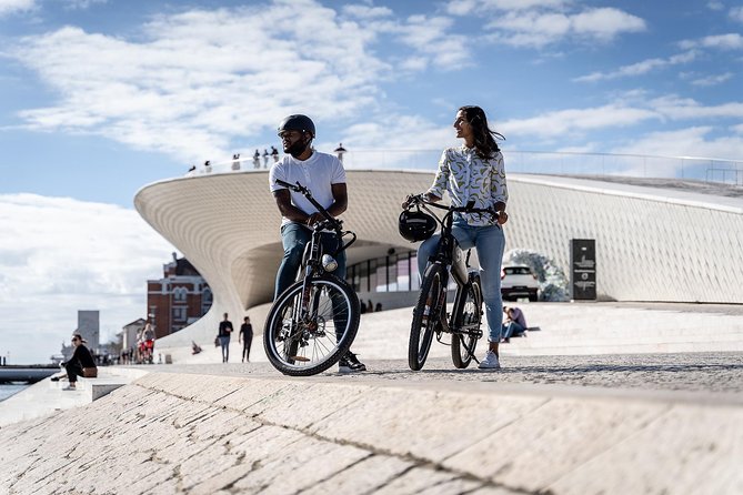 Belém E-Bike Guided Tour Explore Lisbon by the river - Stop 1: Praca do Comercio, Lisbon’s river-facing postcard square