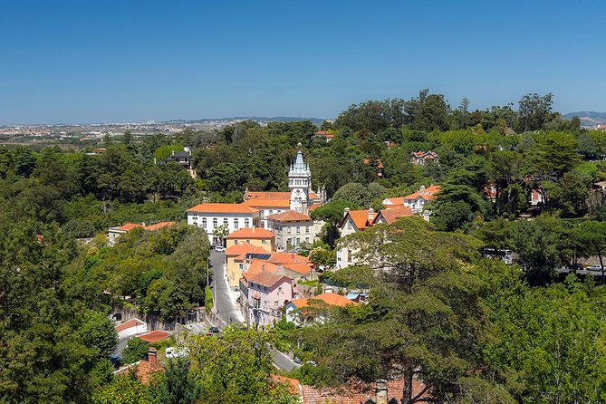 Best of Sintra, Estoril Coast and Two Palaces 8H Private Tour - Estoril and Cascais: casino spy vibes, then sea views and fort walls