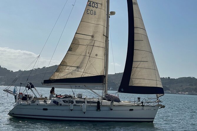 Boat tour in Lisbon with local sailors - Tagus river views from a real sailing boat, not a floating bus