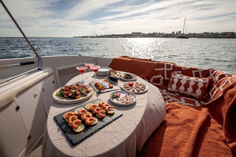 Cascais: Private boat with skipper, fuel, food and drinks - Lisbon from the sea: monuments, coastline views, and discovery stories