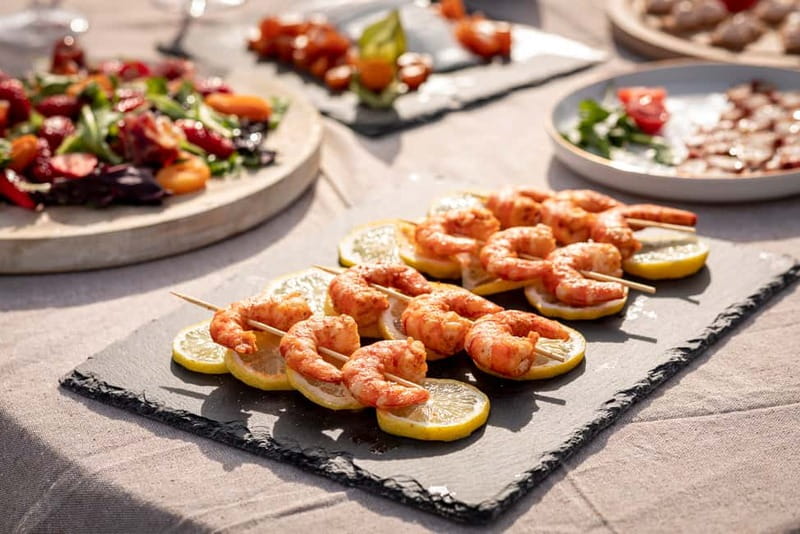 Cascais: Private boat with skipper, fuel, food and drinks - Portuguese snacks and wine, served the way you’ll actually enjoy them