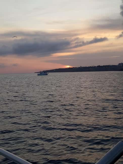 Cascais: Sunset Boat Trip with Welcome Drinks - Boca do Inferno photo stop: the cliffs do the talking