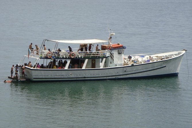 Classic Yacht Experience in Lisbon with portuguese wine - Cristo Rei at a distance: why it is visible, and what it represents