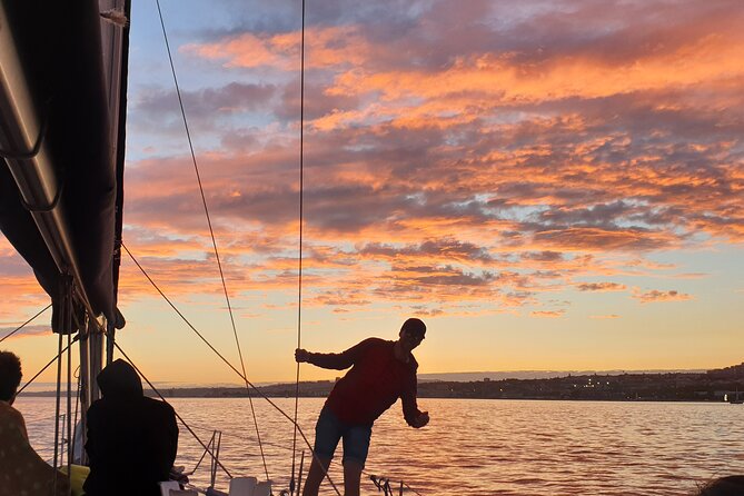 Daytime/Lisbon Sunset Boat with history and wine (small group) - Photo tips for golden hour from the prow and the waterline