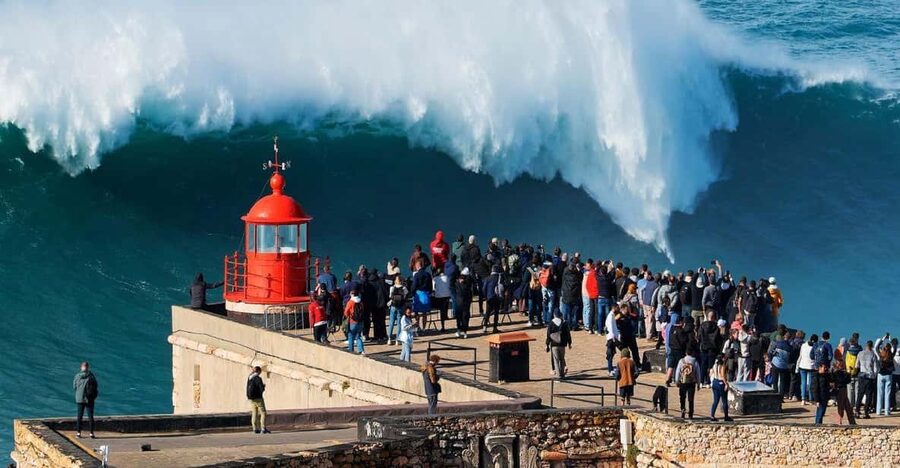 De Lisboa: Óbidos & Nazaré Giant Waves, Ginja & Small Group - Praia do Norte and lunch: where the giant-wave story lives