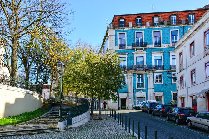 Discover Ancient Lisbon of Tuk Tuk with a local guide - Portas do Sol viewpoint: Tagus River views and Alfama rooftops