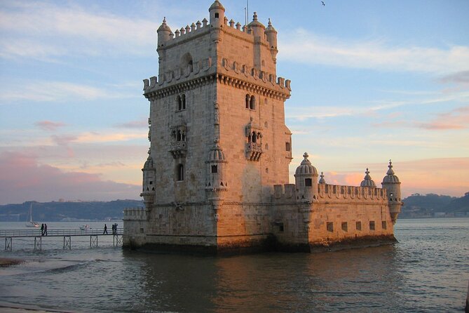 East to West Tour in a Tukxi - Lisbon Cathedral: a Romanesque anchor before the views