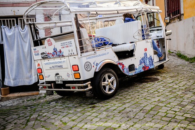 Expert Plus Lisbon Tour with Local Guide in Private Eco Tuk Tuk - Belém Tower Garden, a Fortification and a Ceremonial Gateway