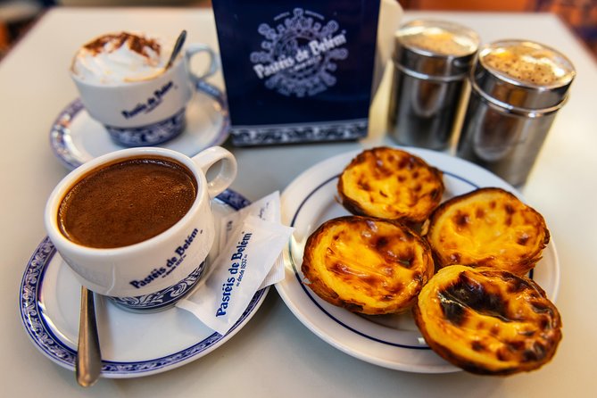 Explore Lisbon City on a private half-day tour in a van - Santa Justa elevator area plus the Chiado to Baixa transition