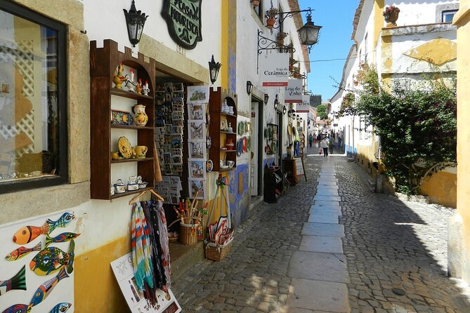 Fátima, Batalha, Nazaré and Óbidos Small Group Tour from Lisbon - Nazaré Proper: Fishing Town Energy and Record-Wave Lore