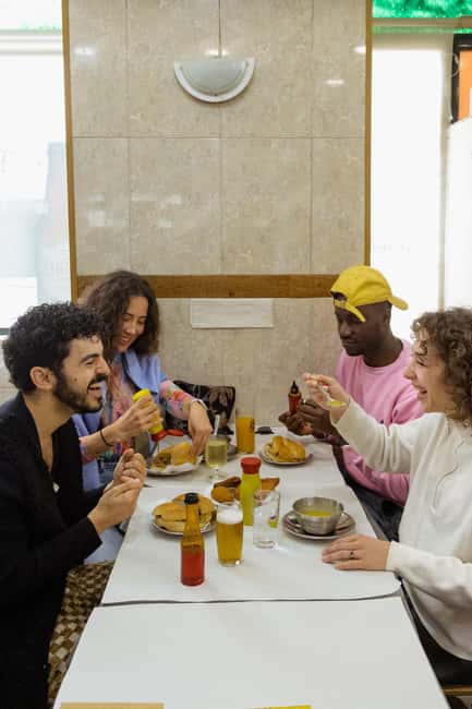 Find Lisbon's soul: Food, Drinks, Stories & a NO-uphill tour - Rua Augusta Arch and your Local Secrets list for after-hours Lisbon