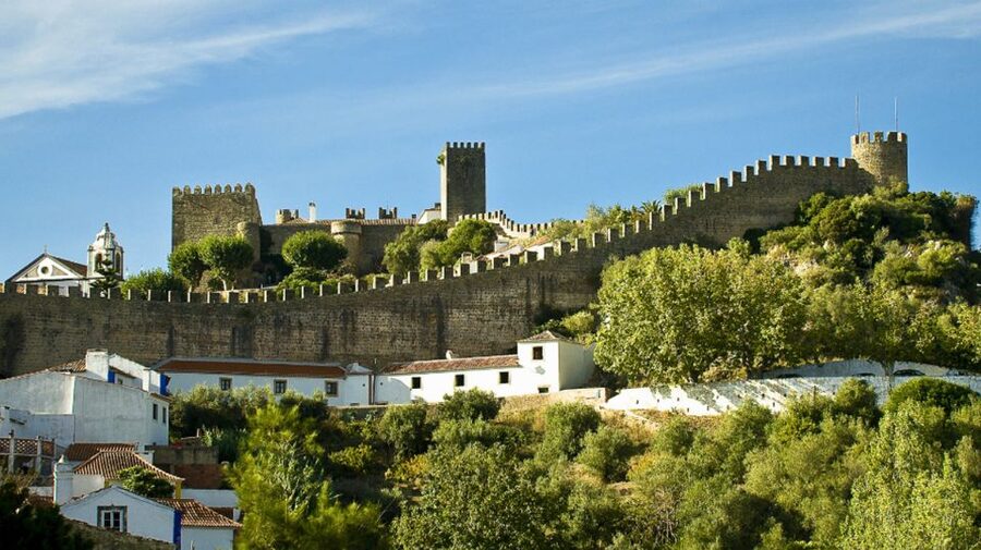 From Lisbon: Fátima, Batalha, Nazaré & Óbidos Full-Day Tour - A northbound day of miracles, battles, waves, and walls