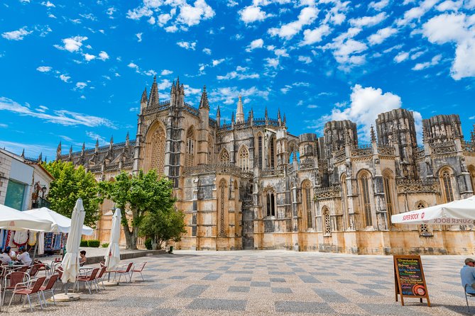 From Lisbon: Fatima Batalha Nazare & Obidos Small Group Day Trip - Nazare’s beach bay in 40 minutes: enjoy the view, skip the full beach plan