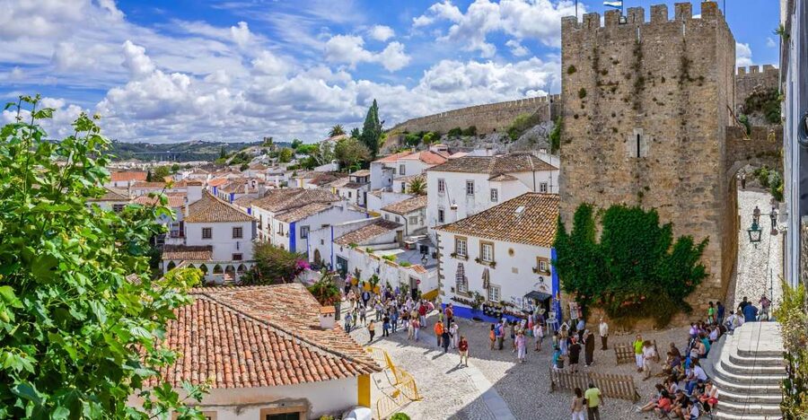 From Lisbon: Fatima, Nazare, and Obidos 8-People Group Tour - Setting Out From Lisbon, In a Van That Makes the Day Feel Manageable