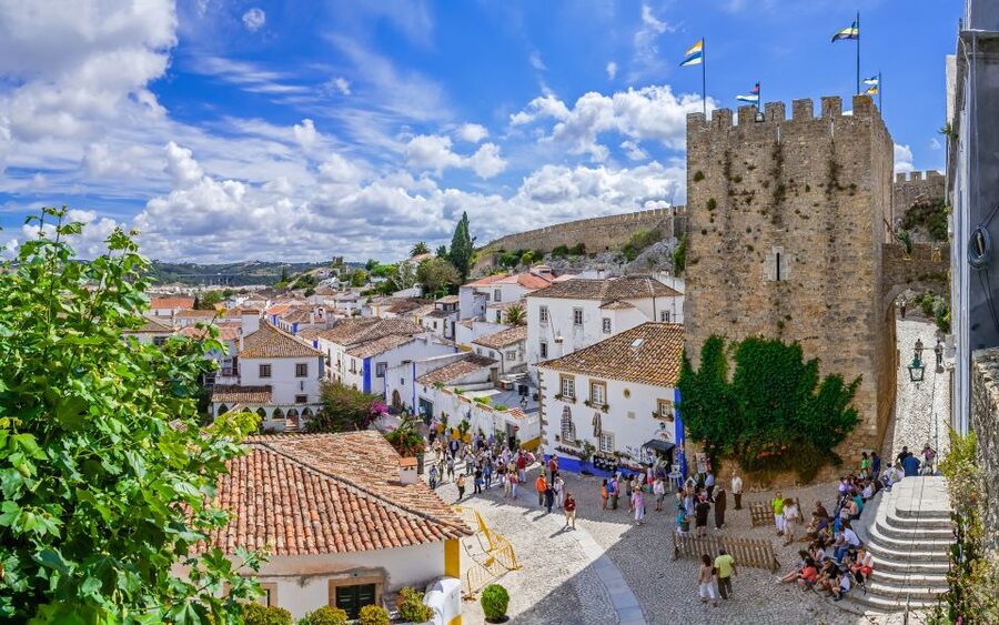 From Lisbon: Fatima, Nazare, and Obidos 8-People Group Tour - Obidos Medieval Streets, City Walls, and the Ginjinha Moment