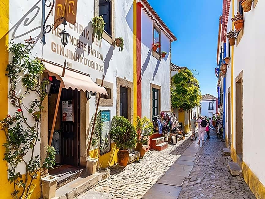 From Lisbon: Fatima, Nazaré, and Obidos Small Group Tour - From Lisbon to three worlds at once