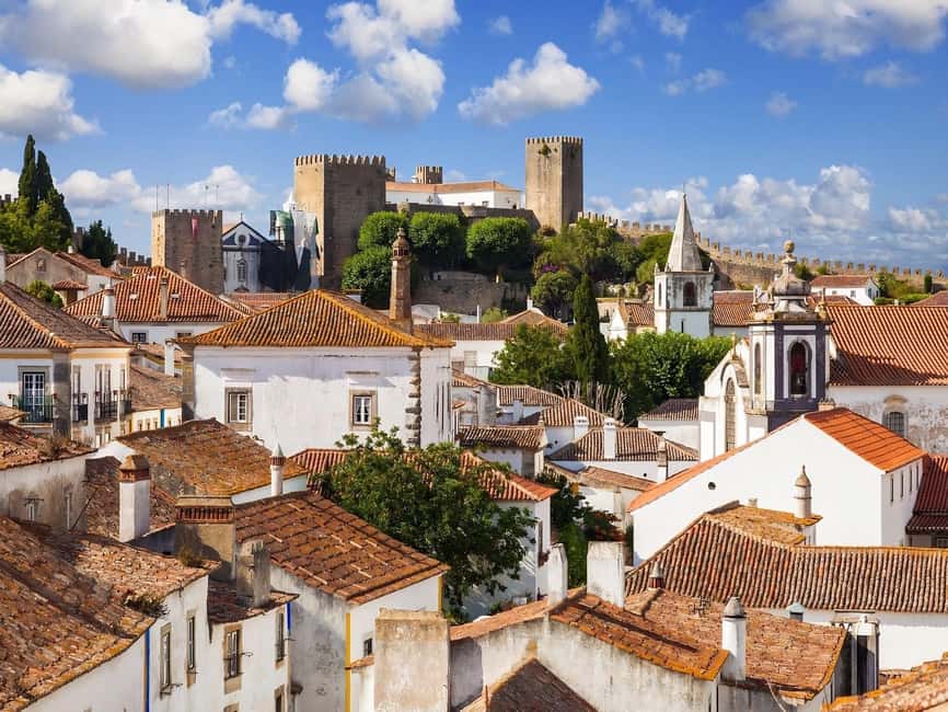 From Lisbon: Fatima, Nazaré, and Obidos Small Group Tour - Óbidos: medieval walls, Santa Maria, and ginjinha at the right moment