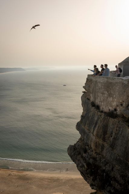 From Lisbon: Fátima, Nazaré and Sintra Guided Tour - Nazaré’s Coastal Contrast: Epic Big-Wave Energy and Lunch on Your Terms