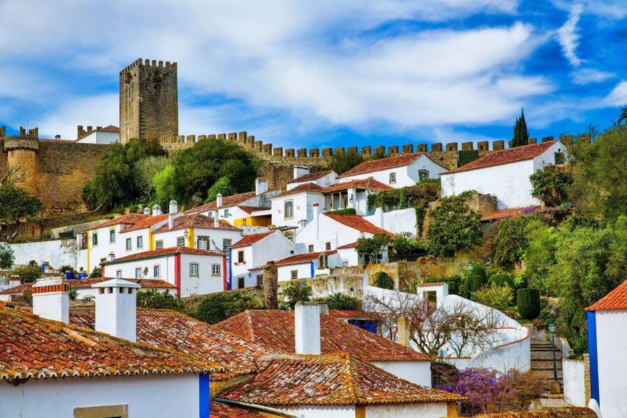 From Lisbon: Fátima Sanctuary, Nazaré & Óbidos - Fátima Sanctuary: A pilgrimage site with guided context and quiet space