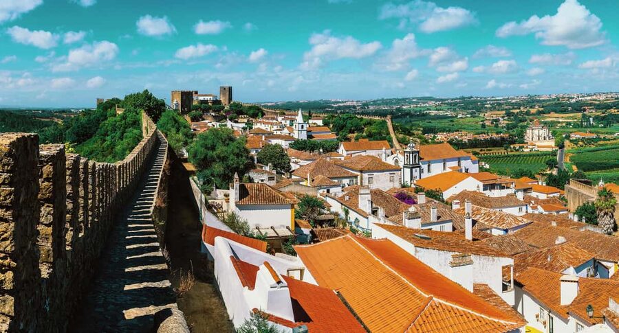From Lisbon: Nazare Big Waves & Óbidos Small Group Tour - Nazaré waterfront and fishing heritage: what to do during your free time