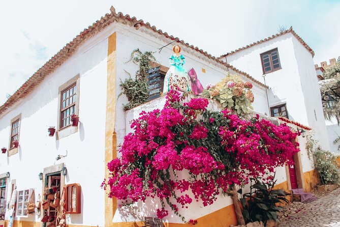 From Lisbon : Óbidos & Nazaré Giant Waves, Ginja & Small Group - From Lisbon To Two Very Different Portuguese Worlds