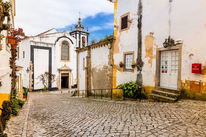 From Lisbon : Óbidos & Nazaré Giant Waves, Ginja & Small Group - Stop 3: Farol de Nazaré and Fort São Miguel Arcanjo Viewpoints