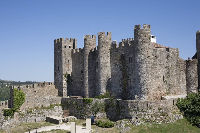 From Lisbon : Óbidos & Nazaré Giant Waves, Ginja & Small Group - Guides and Group Style: Why John, Navaz, and Jal Matter