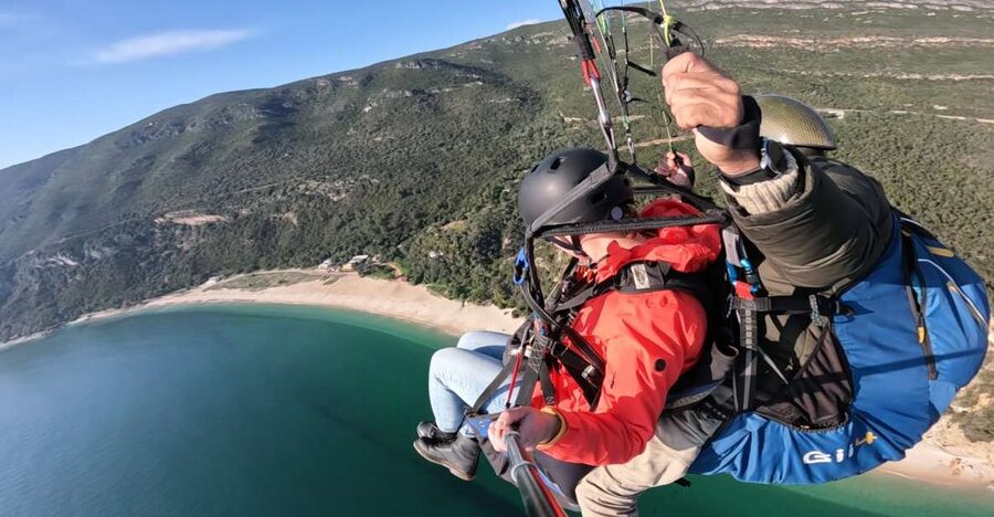From Lisbon: Paragliding Pack (Flight+Video+Transportation) - Tandem flight over Fonte da Telha, Bicas Beach, and Arrábida