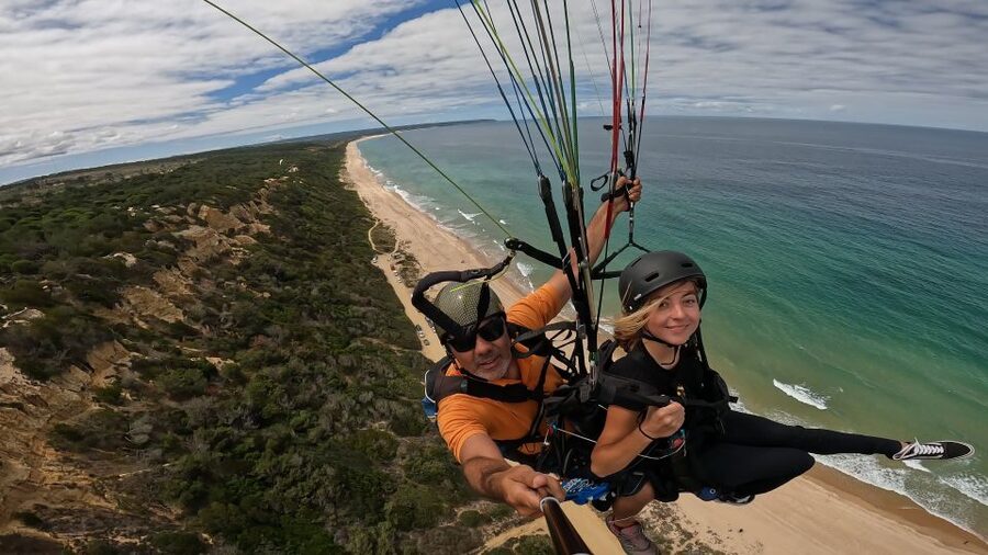 From Lisbon: Paragliding Pack (Flight+Video+Transportation) - Small group size and English instruction: comfort and control