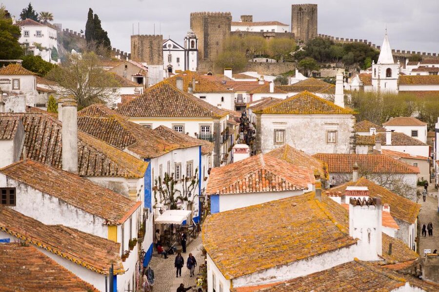 From Lisbon: Shared Tour to Fátima, Óbidos, Batalha e Nazaré - Nazaré: North Beach Views, Surf Atmosphere, and a Local Spiritual Note