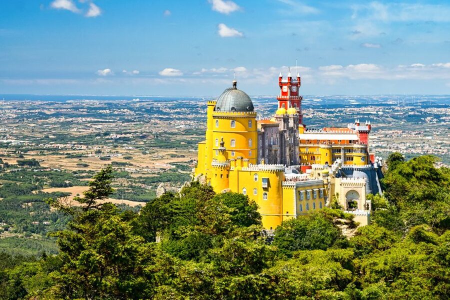 From Lisbon: Sintra to Cascais Full-Day Guided E-Bike Tour - Sintra’s palaces by bike: National Palace, Quinta da Regaleira, and the Pena view