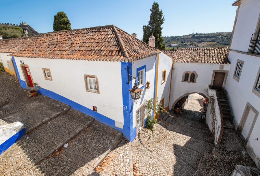 From Lisbon: Tour to Óbidos and Nazaré - Medieval Village, Ginja, and Giant Waves - Watching surf when the waves are smaller than expected