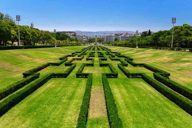Full Day Lisbon Tour with Local Guide in Private Eco Tuk Tuk - Tagus River orientation, plus the 25th April Bridge from the road