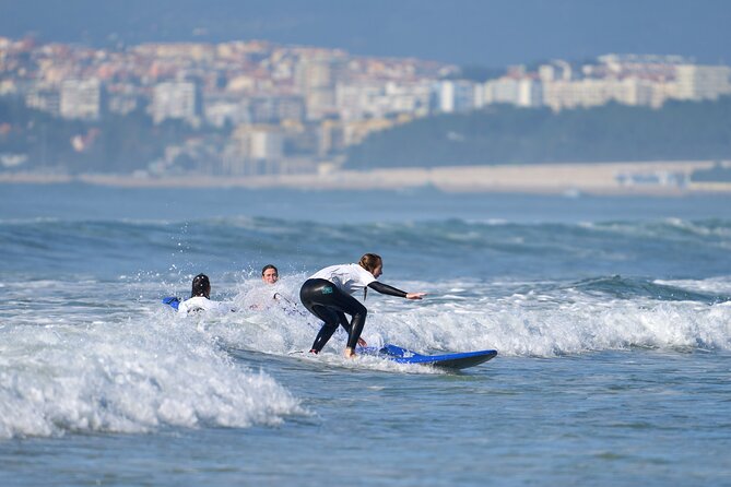 Group Surf Lesson in Costa da Caparica - Included Gear, Wetsuit Clasp Detail, and Leash Basics