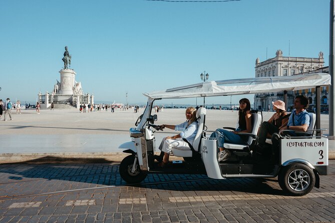 Historic Lisbon Tour with Local Guide in Private Eco Tuk Tuk - Alfama’s Cathedrals, Folk Music, and the View at Portas do Sol
