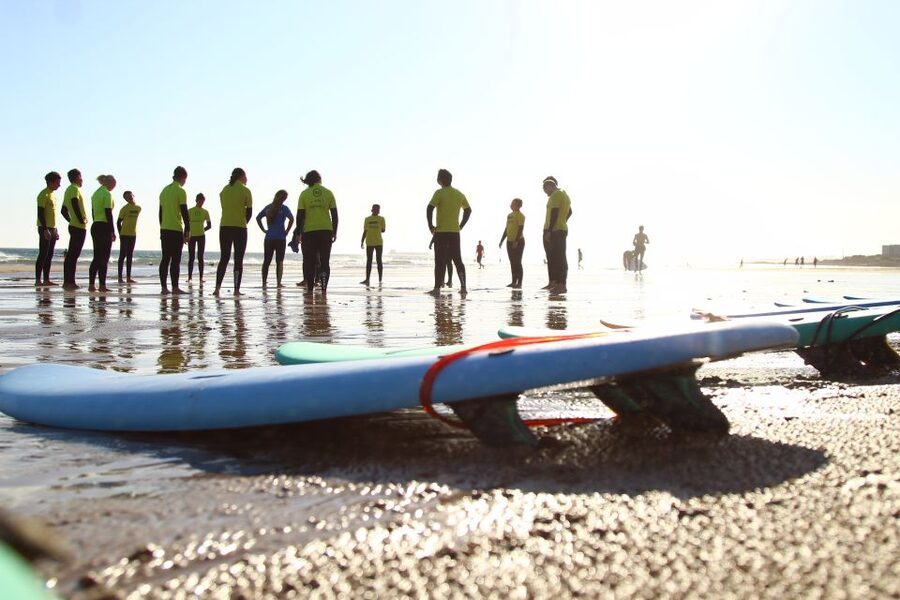 Lisbon: 1.5-Hour Surf Lesson - What happens before you paddle out: wetsuit, safety briefing, and sand practice