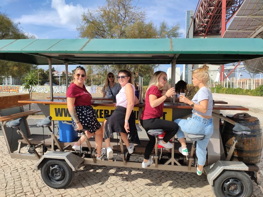 Lisbon: 1-Hour Beer Bike Tour with Draft Beer & Sangria Ride - Fado landmarks and bridge moments that make the hour feel longer