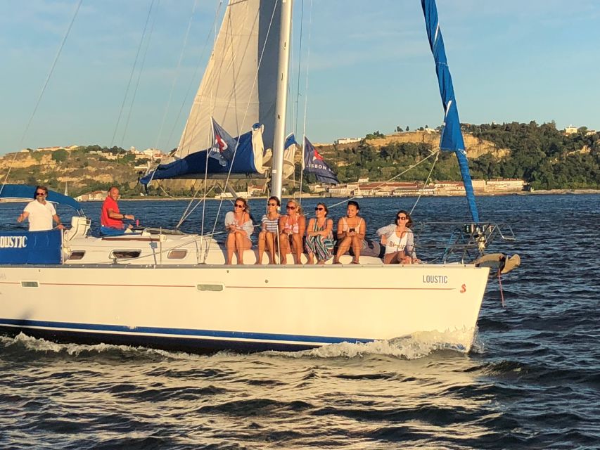 Lisbon 2-Hour River Cruise - Board life on a small sailboat: what the welcome drink and guide style mean