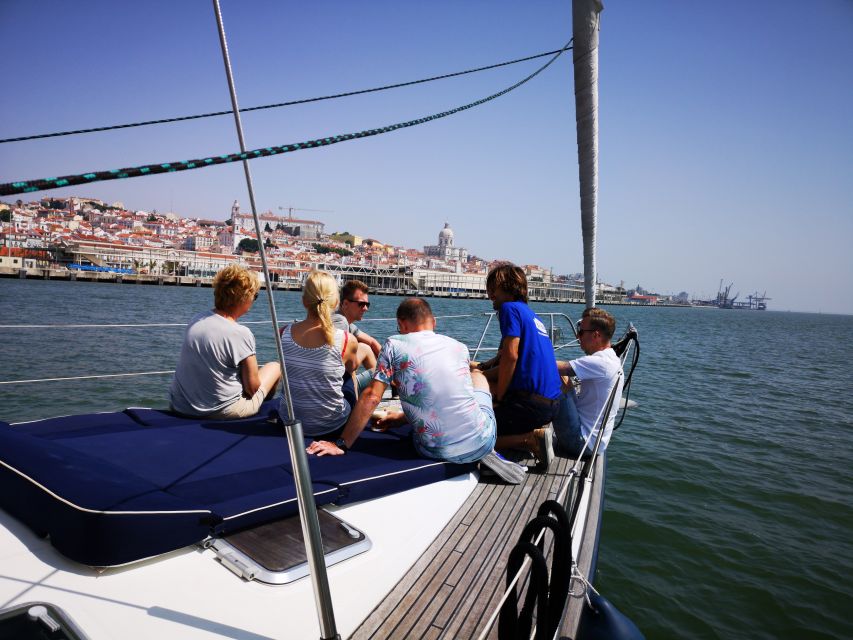 Lisbon: 2-Hour Sailing Yacht Cruise & Guided Tour w/2 drinks - Belem Tower to the Ponte 25 de Abril: iconic sights in motion