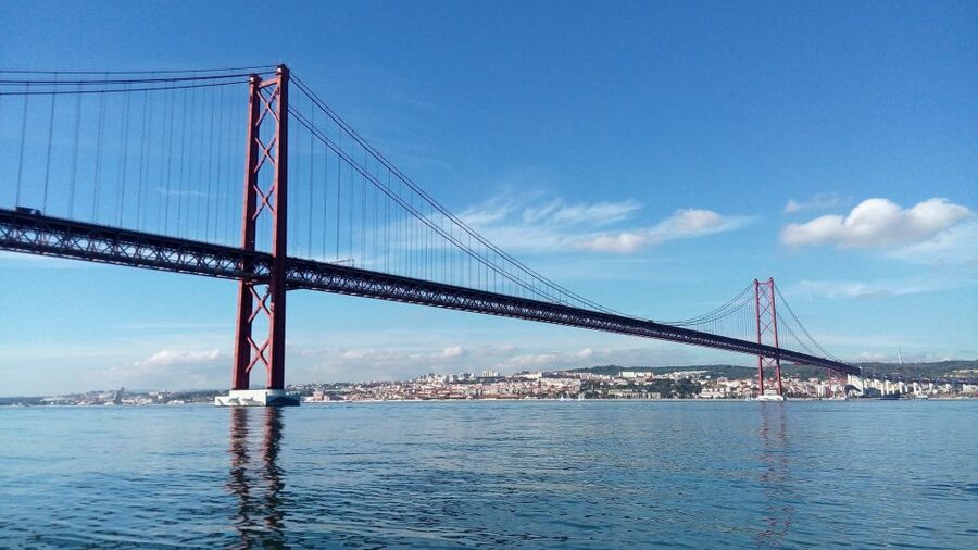 Lisbon: 2-Hour Sailing Yacht Cruise & Guided Tour w/2 drinks - Seeing Praça do Comércio via Rua Augusta Arch, not just on a postcard
