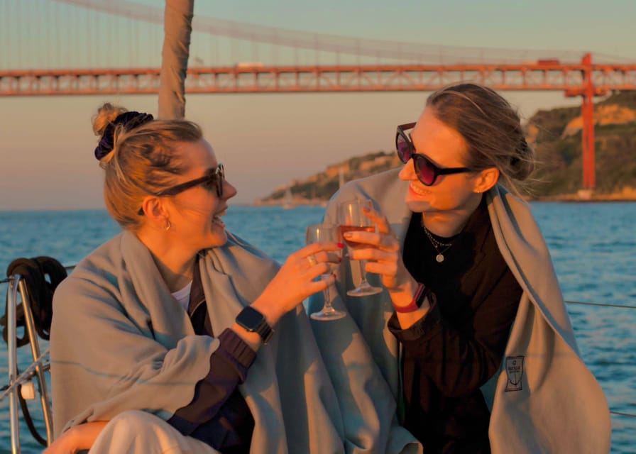 Lisbon 2 Hours Sailing Day Tour and Cruise With Drinks - Onboard comfort: drinks, blankets, and music that set the tone