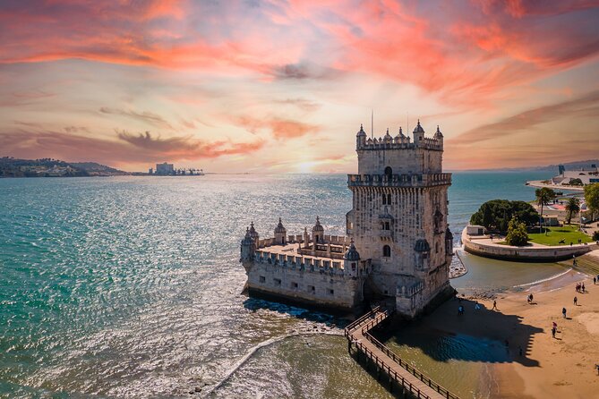 Lisbon 360 City Tour: Bike tour, Boat Trip and Helicopter Flight - Belém monuments by the water: Torre de Belém and the 25 de Abril Bridge