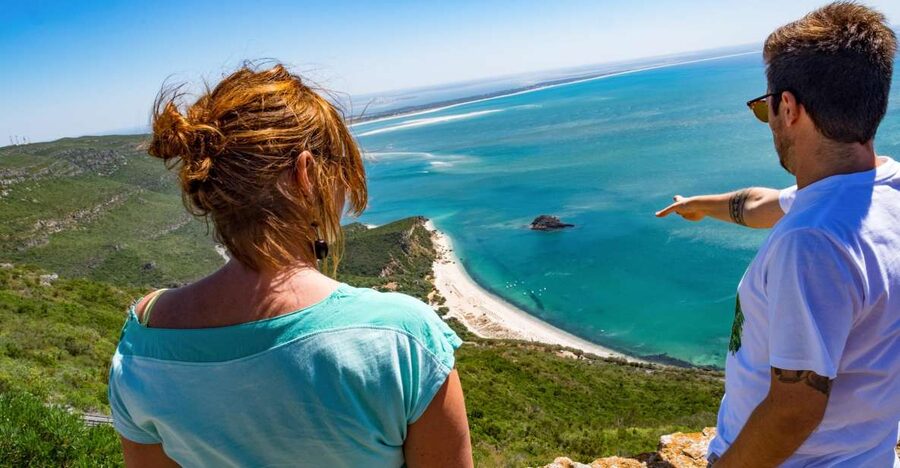 Lisbon: Arrábida Natural Park and Sesimbra Day Trip - Meco Beach cliffs: your first real look at the Atlantic side
