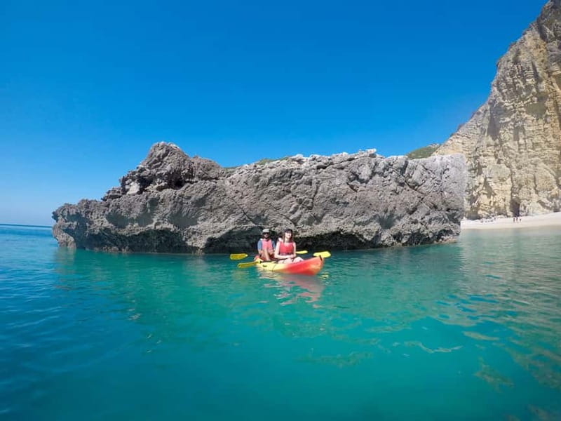 Lisbon: Arrabida Park Kayak Tour with Beach Picnic - Paddling Sesimbra’s coastline, caves, and limestone cliffs