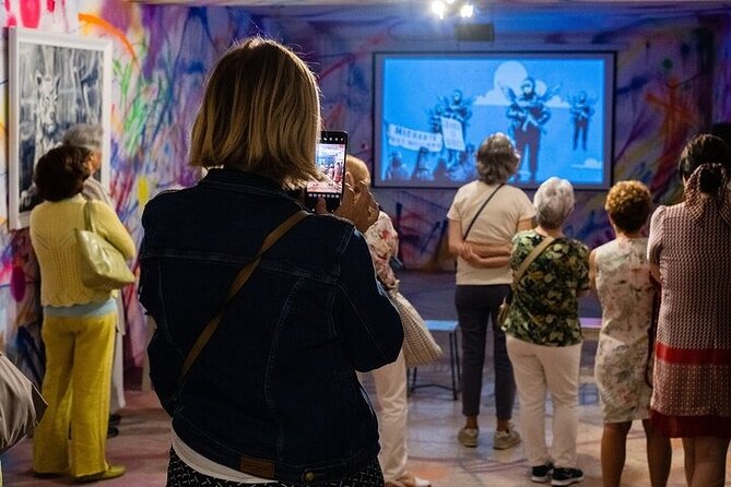 Lisbon Banksy Museum Admission Ticket - What You See Inside: Murals, Canvases, Projections, and Video