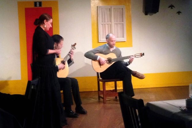 Lisbon By Night with Dinner and Fado Show Included - Night drive past illuminated monuments: the in-between magic