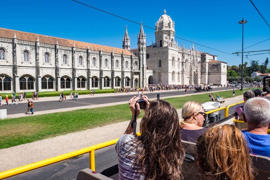 Lisbon: City Sightseeing Hop-On Hop-Off Bus Tour - Walking tours and a night panoramic bus: when you want the real vibe